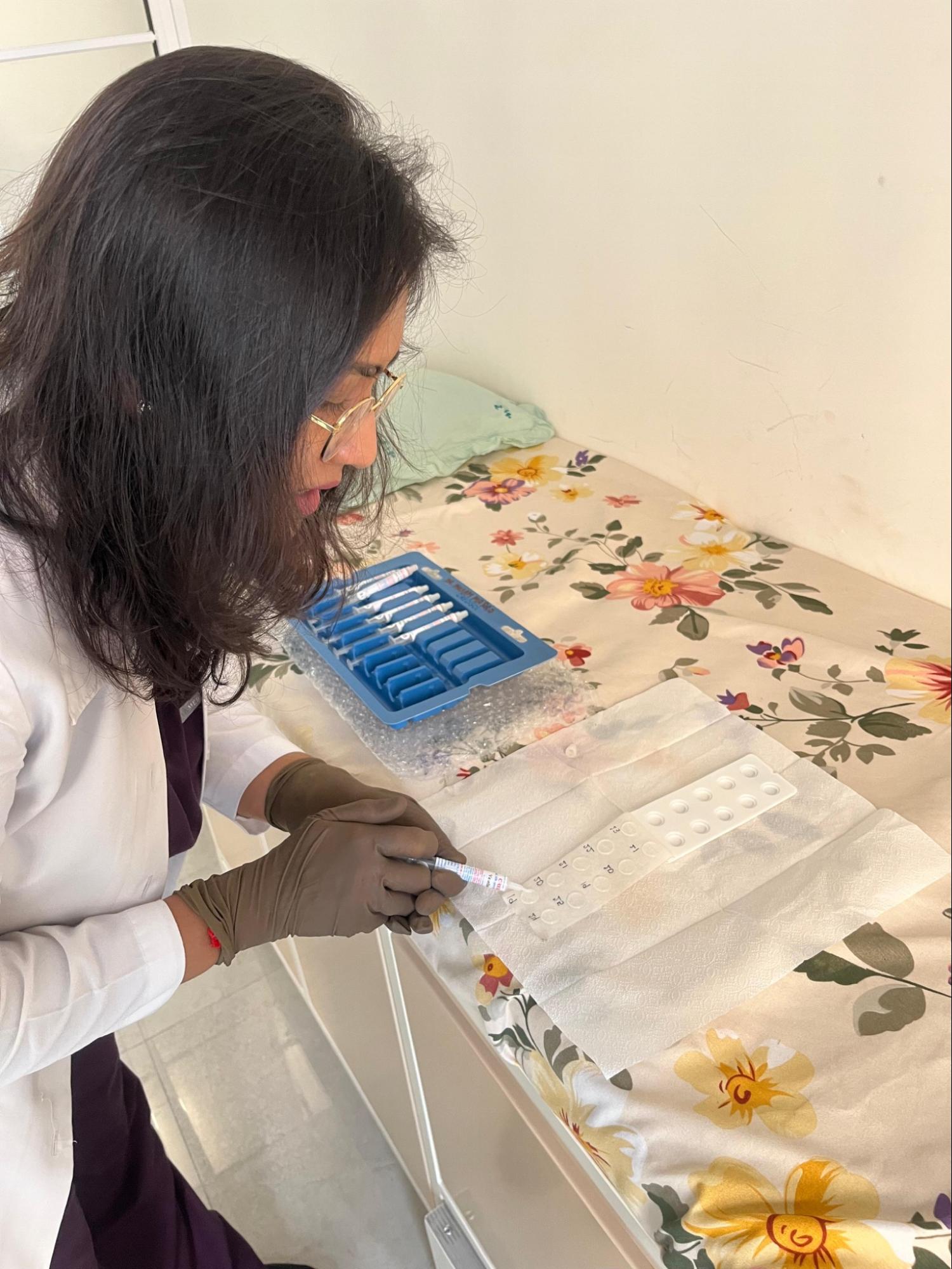 Dr. Maroo preparing allergen extracts for skin prick testing
